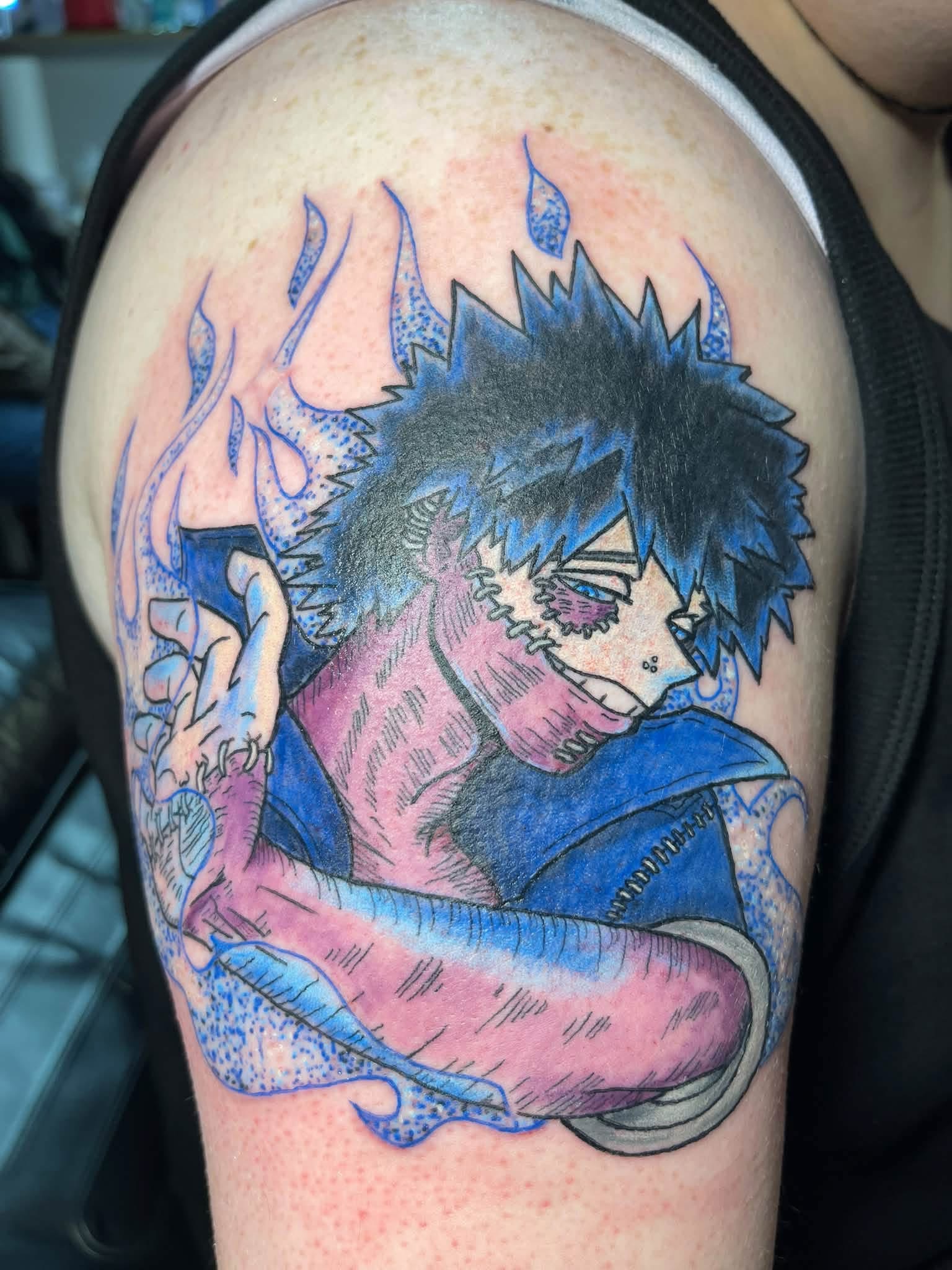 Blue-haired anime character tattoo