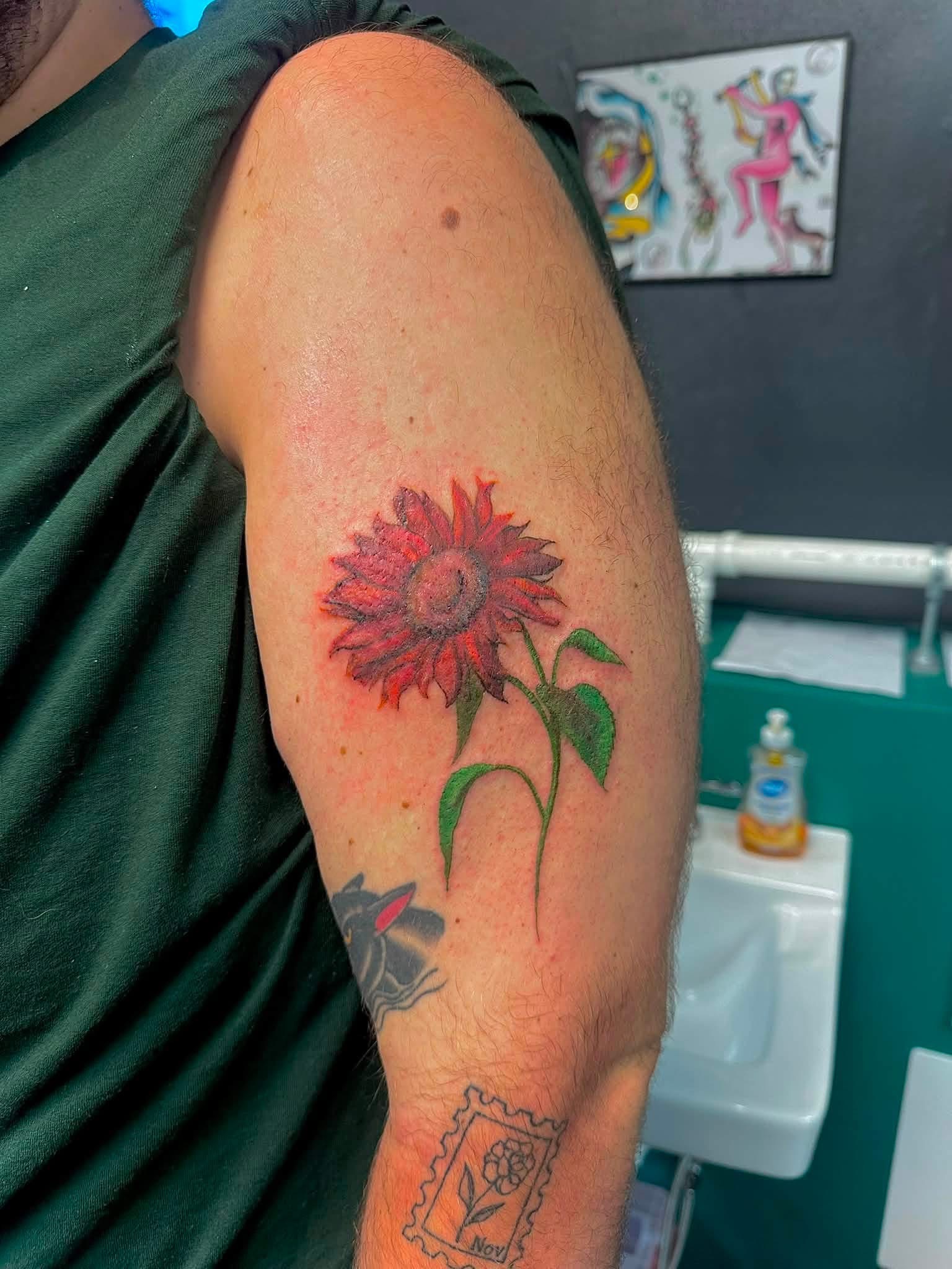 Sunflower arm tattoo