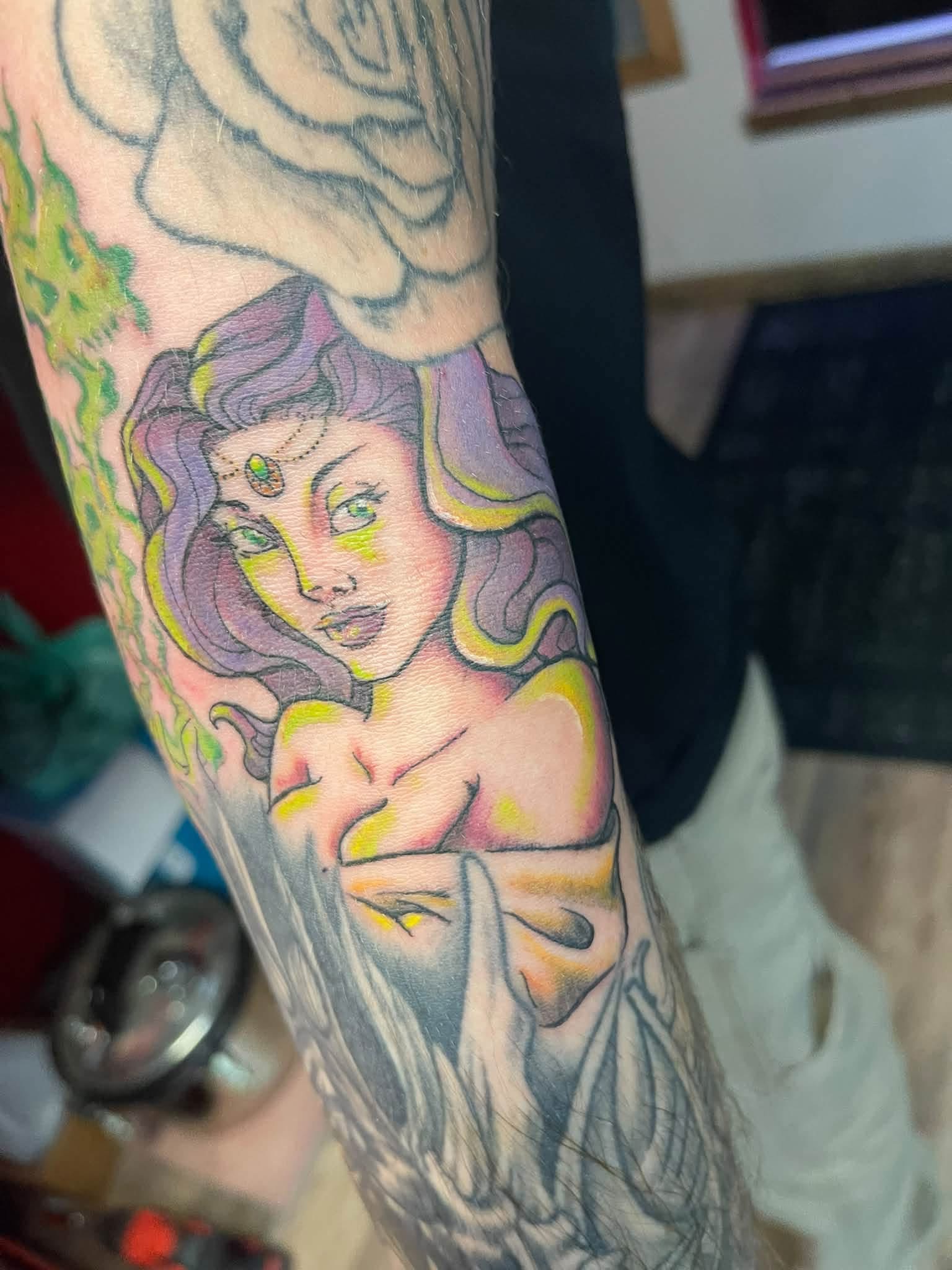 Color portrait tattoo of two characters
