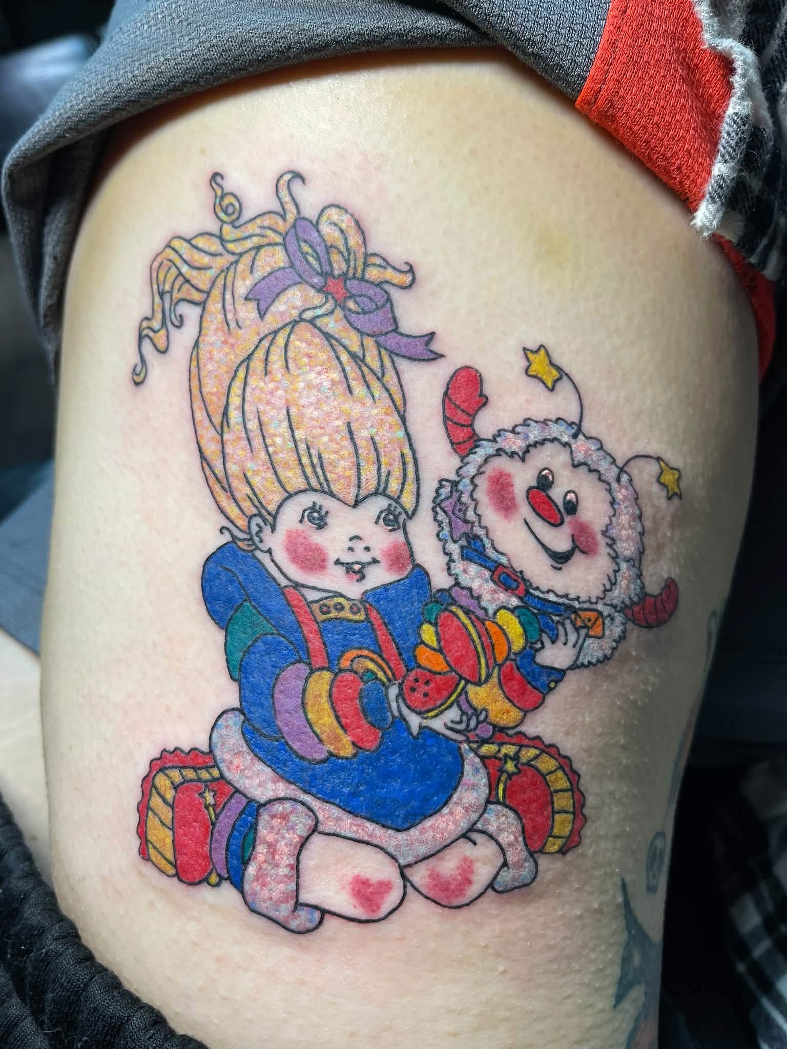 Girl and clown tattoo