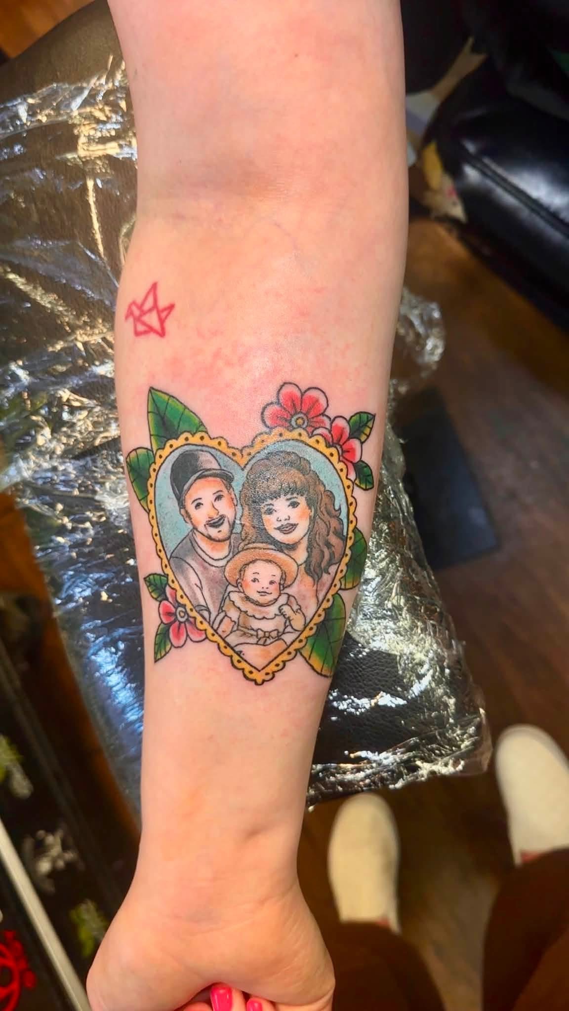 Family portrait heart tattoo